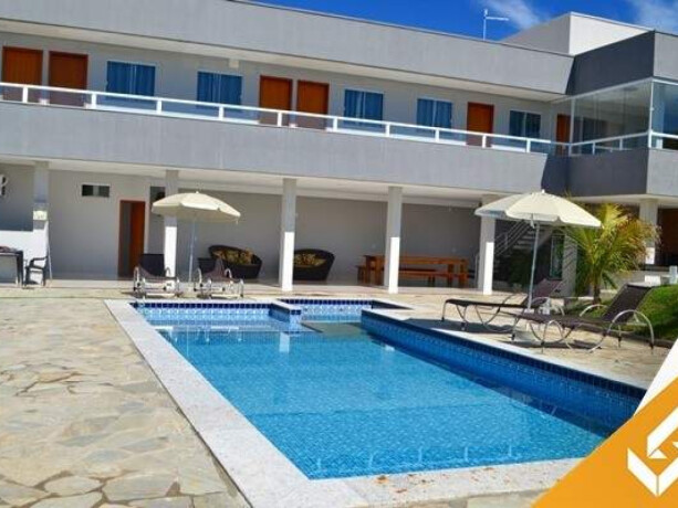 casa-de-temporada-em-caldas-novas-caldas-novas-goias-magnifico-sobrado-c-8-suites-e-piscina-quente-hibrida-chidromassagem-ideal-para-grupos-maiores-big-0