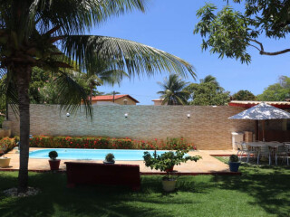 Casa de temporada em Guarajuba, Camacari Bahia. Aluguel Temporada - Mar Azul - Casa 5 quartos com ar - Piscina e churrasqueira